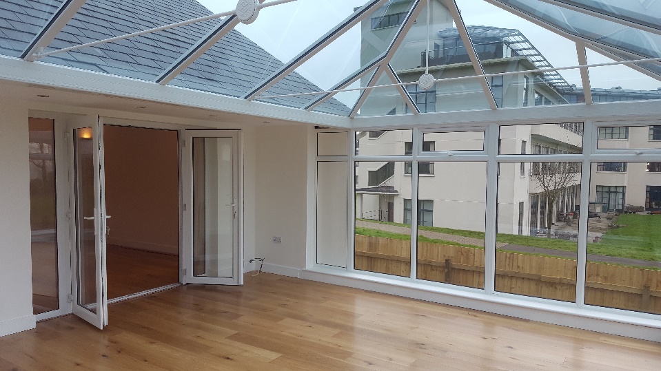 Glass solarium addition from Four Seasons Sunrooms. 